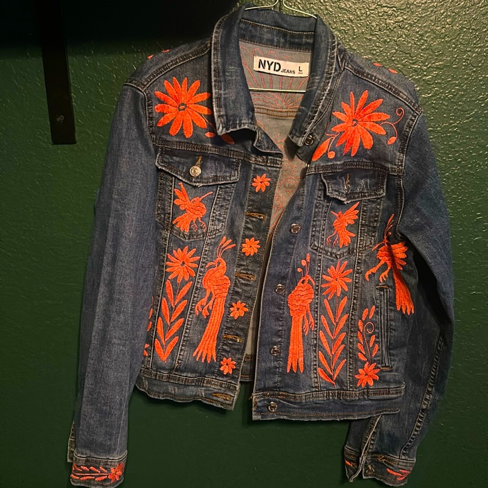 NYD denim jacket with pink accents